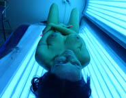 Naked woman in solarium